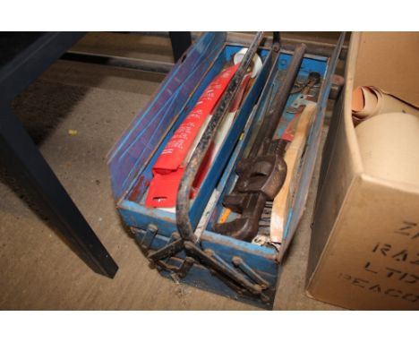 A metal cantilever tool box and contents