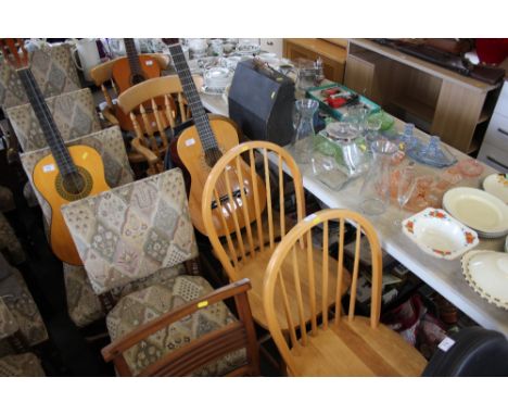 Three beech stick back kitchen chairs and a pair of beech spindle back elbow chairs  