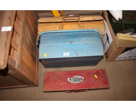 Two cantilever tool boxes and contents; a spirit level and a brick tool socket set 