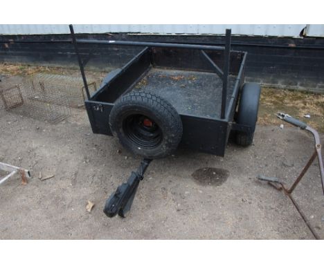 A 4ft x 3ft6in single axle trailer with ladder rack and spare wheel