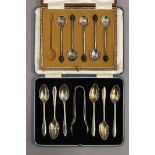 A cased set of silver teaspoons and tongs, and a part set of silver coffee spoons. 4.