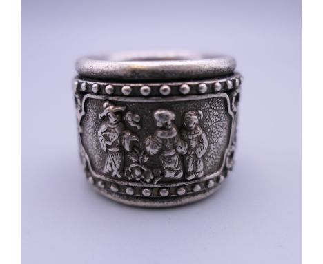 A silver archer's ring. 2.25 cm high.