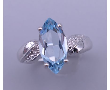 A silver aquamarine ring. Ring size O/P.