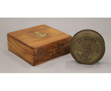 A boxed Mary Rose compass. The box 11 cm wide.