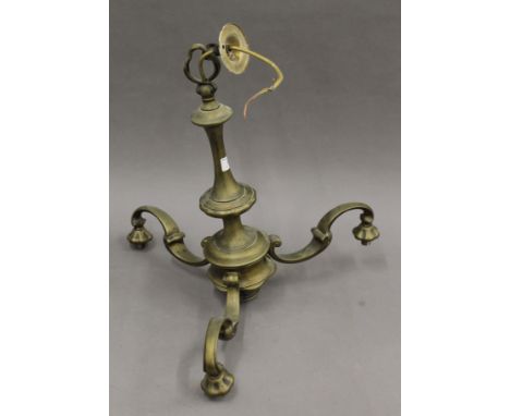 A brass chandelier. 49 cm high.