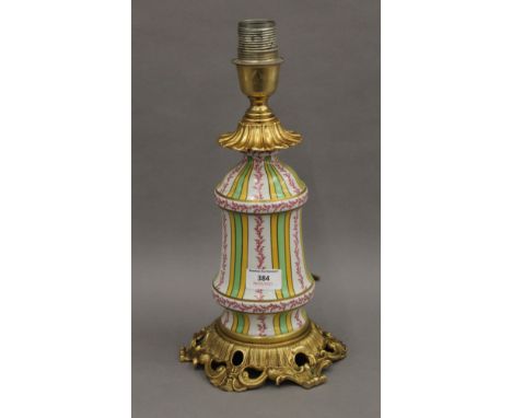 A decorative porcelain lamp. 37 cm high.