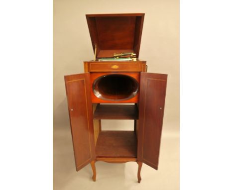 An Edwardian inlaid mahogany Cliftophone gramophone cabinet with integral speaker. 48 cm wide x 129 cm high closed.