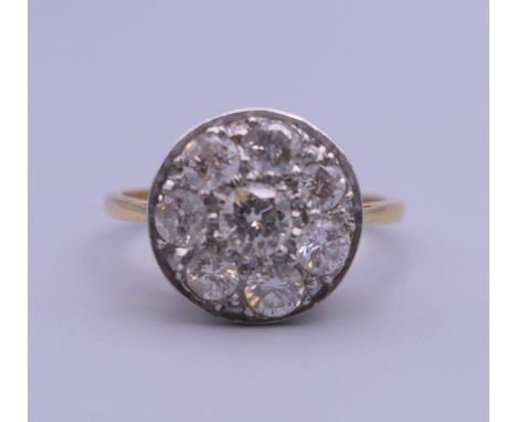 An 18 ct gold diamond ring. Ring size M/N.