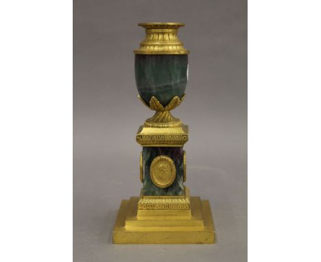 A gilt metal mounted urn form candlestick in the style of MATTHEW BOULTON. 21 cm high.