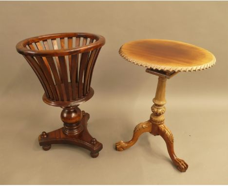 A modern mahogany tripod table and a modern planter. The latter 71 cm high.