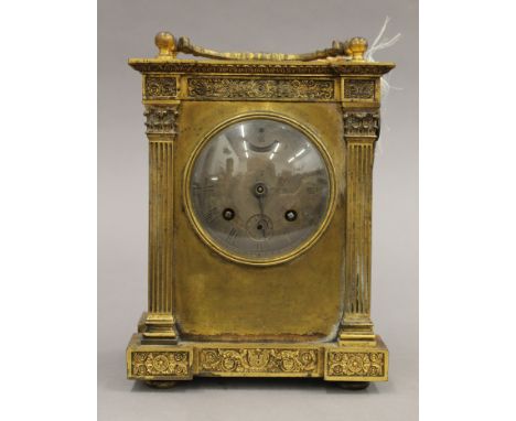 A 19th century French brass cased mantle clock. 24 cm high.