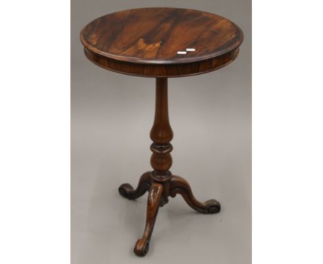 A 19th century rosewood tripod table. 51 cm diameter.