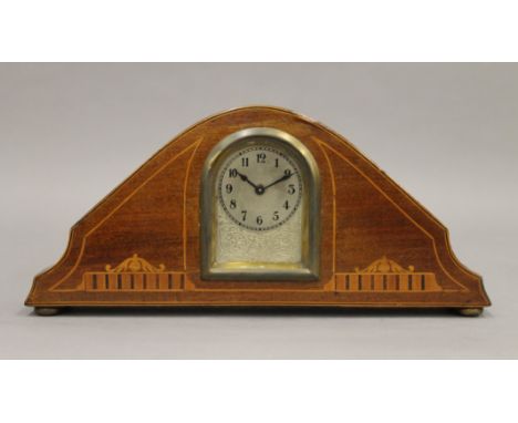 An Edwardian inlaid mahogany mantle clock. 24.5 cm wide.