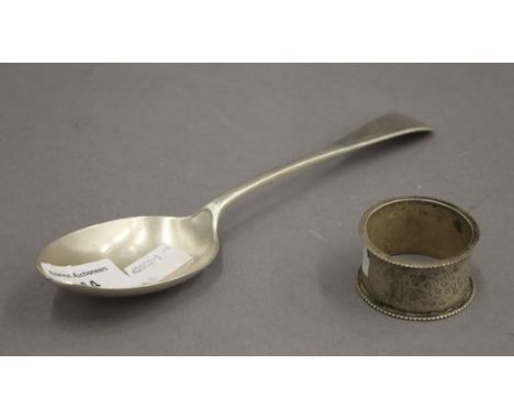 A silver spoon and a silver napkin ring. 3.2 troy ounces.