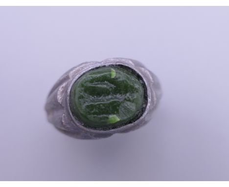 A seal top ring. Ring size U/V.