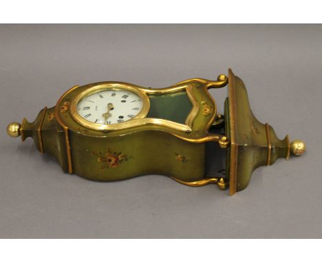 A Swiss florally decorated bracket clock and bracket. The former 30.5 cm high.