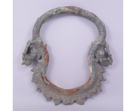 A RARE 12TH CENTURY CAMBODIAN KHMER BRONZE PALANQUIN LARGE RING, 19.5cm x 18cm.