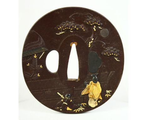 A JAPANESE BRONZE SHAKUDO TSUBA, depicting two figures in a courtyard scene beneath a tree, signed, 8.5cm x 8cm.