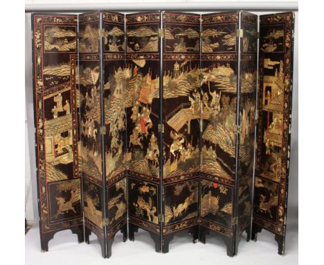 A LARGE CHINESE EIGHT PANEL LACQUER SCREEN, carved and painted with traces of gilt, depicting samurai on horseback and other 