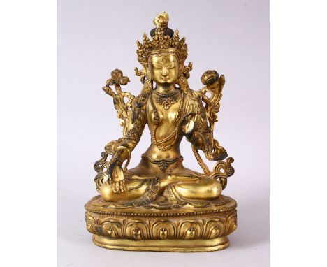 A THAI GILT BRONZE SEATED FEMALE DIETY, 20cm high.
