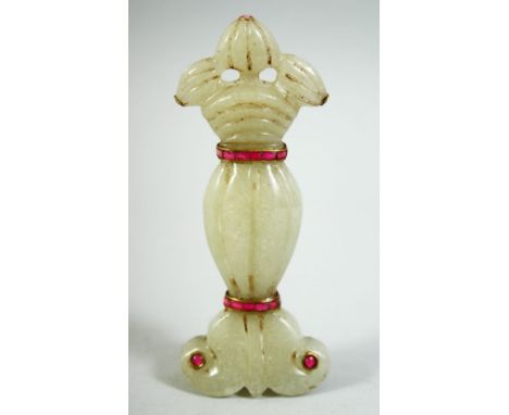 AN INDIAN CARVED JADE DAGGER HANDLE, with onlaid wirework and semi precious stones, 13cm long.