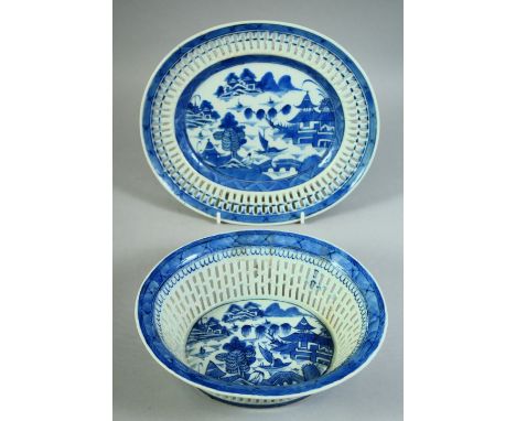 A CHINESE BLUE AND WHITE PORCELAIN OVAL BASKET AND STAND, basket 22.5cm wide.