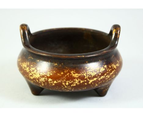 A CHINESE GOLD SPLASH BRONZE CENSER, with six character mark to base, 13cm diameter.