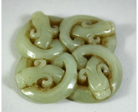 A SMALL CARVED AND PIERCED JADE PENDANT, 4.5cm square.