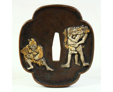 A JAPANESE BRONZE SHAKUDO TSUBA, of quatrefoil form depicting figures to one side, the reverse with a mountainous landscape, 