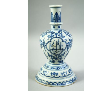 A CHINESE BLUE AND WHITE PORCELAIN CANDLE STAND, for the Islamic market, with calligraphic decoration, six character mark to 