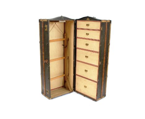 A good quality Art Deco period cabin / steamer trunk, fitted six graduated drawers, fold out coat hanger etc., bearing triang