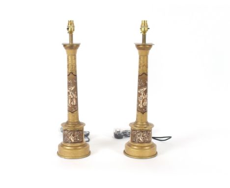 A pair of Toleware style table lamp bases, decorated in the chinoiserie manner, 60cm high