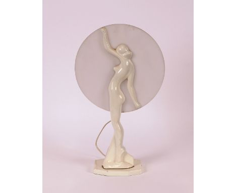 A 1960's/70's style large white plastic nude girl table lamp