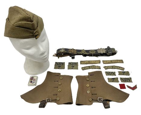 Scout's leather belt mounted with fifteen military cap/glengarry badges including Highland Light Infantry, Royal Marines, RA,