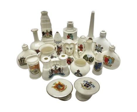 Eighteen WW1 crested china military models including artillery shells, visor caps, water bottles, binoculars, war memorials/c