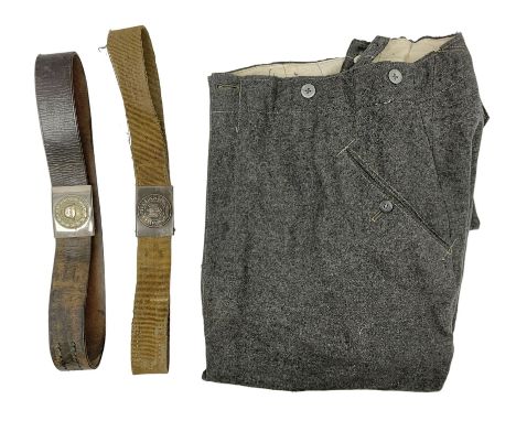 Pair of WW2 German Other Ranks trousers c1940-42, stamped C.& A. Brenninkmeyer Workstatten; WW2 German Army webbing belt with