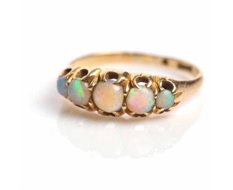 OPAL FIVE STONE RING
with five graduated round cabochon opals, in gold, hallmarks worn, size O