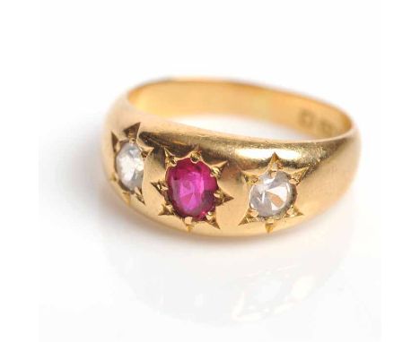 VICTORIAN RUBY RING
star set with central oval ruby, flanked by two star set white gems, hallmarked for eighteen carat yellow