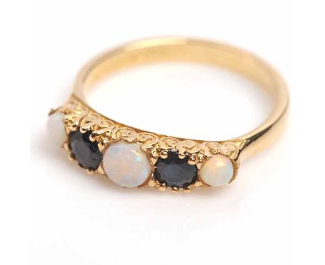 OPAL AND SAPPHIRE RING
set with round opals and oval sapphires, in a Victorian style setting, in gold