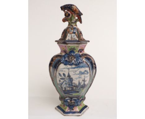 18th/19thC Delft polychrome baluster vase and cover with parrot finial, signed to base with three arrows, H40cm