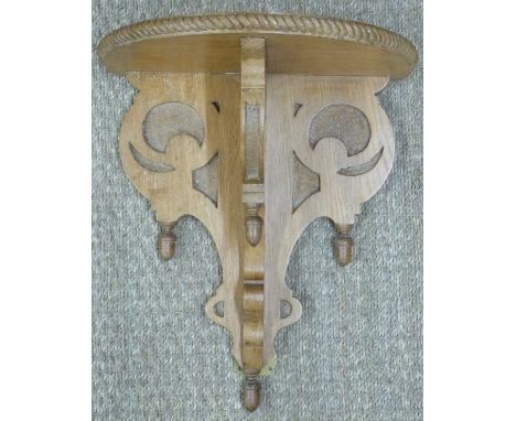 A 19th or early 20th century oak wall bracket, W40 x H45cm
