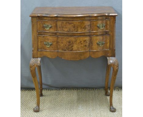 Small burr walnut desk or side table with two drawers and shaped front, raised on cabriole legs, W61 x D42 x H72cm