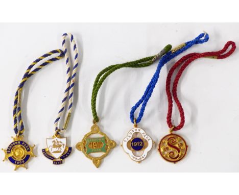 Five Edwardian and George V Sandown Park horse racing enamel badges, each with member's number to rear, comprising 1909, 1910