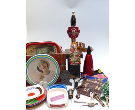 A quantity of brewerania including vintage Schweppes wooden crate, metal trays including Woodpecker, beer engine, cast metal 
