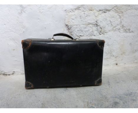 Metal travelling trunk and a vintage suitcase