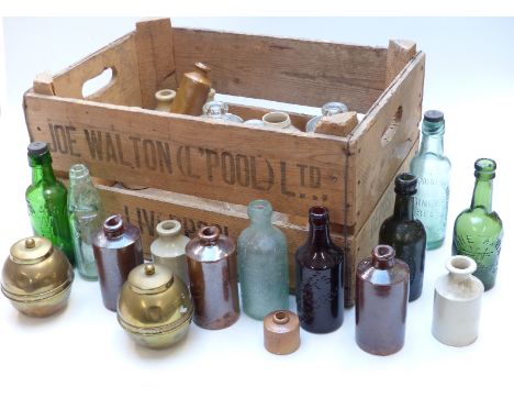 A collection of glass and stoneware bottles to include Nibletts and R Whites etc together with Lipton's British Empire Exhibi