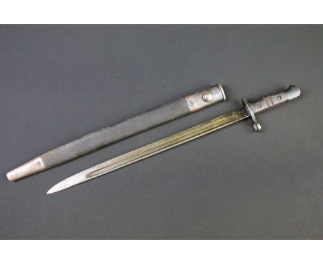 A World War One 1913 pattern bayonet complete with original leather scabbard. 