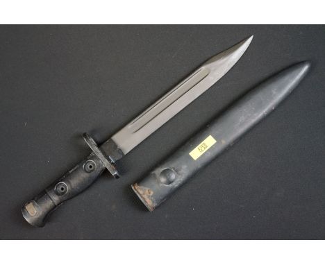 A British L.1.A.1. SLR rifle bayonet together with scabbard. 