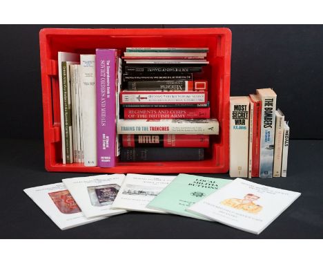 A large collection of military reference books to include Badge, Button, Medal and uniform examples. 