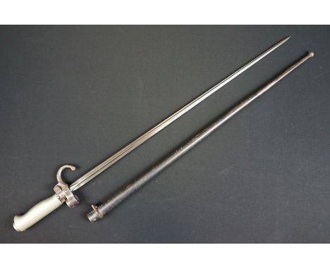 A French Model 1886 Epee Lebel Bayonet together with scabbard. 